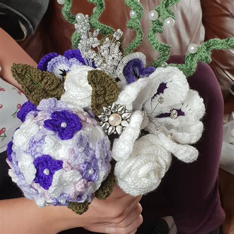 A gorgeous heirloom for the couple, and a labor of love! I crocheted my daughter's wedding bouquet : crochet