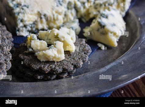 Charcoal Biscuits With Mature English Stilton Cheese Stock Photo Alamy