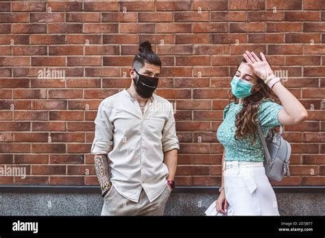 Man Woman Couple Looking Wearing Face Mask Masks Covid 19 Hi Res Stock