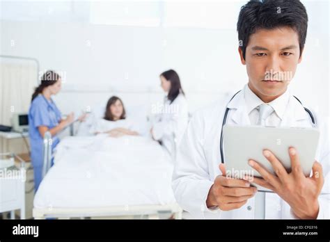 Doctor Treating Patient Hi Res Stock Photography And Images Alamy