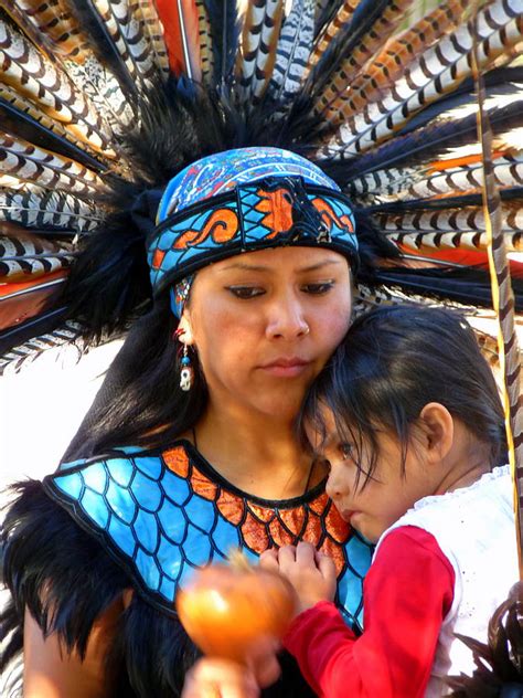 Studio portrait of mountain wolf woman, also known as stella blowsnake whitepine stacy. Native American Woman And Child Photograph by Jeff Lowe