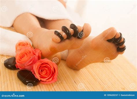 Woman Receiving Hot Stone Massage On Feet Isolated Stock Image Image Of Towel Girl 109620237