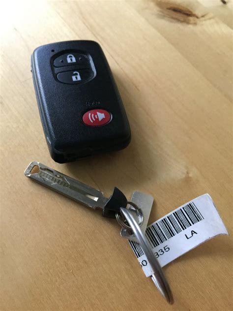 Once usually locks the doors and twice will get the confirmation beep so i'm guessing that sets the but mines a 2010 and other years may be different. For Sale - 2010 Prius Smart Key Fob FOR SALE | PriusChat