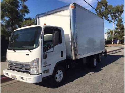 No more crawling in from the back of the cap. Isuzu NPR-HD Side Door 14ft Box Truck with Liftgate 14 ...