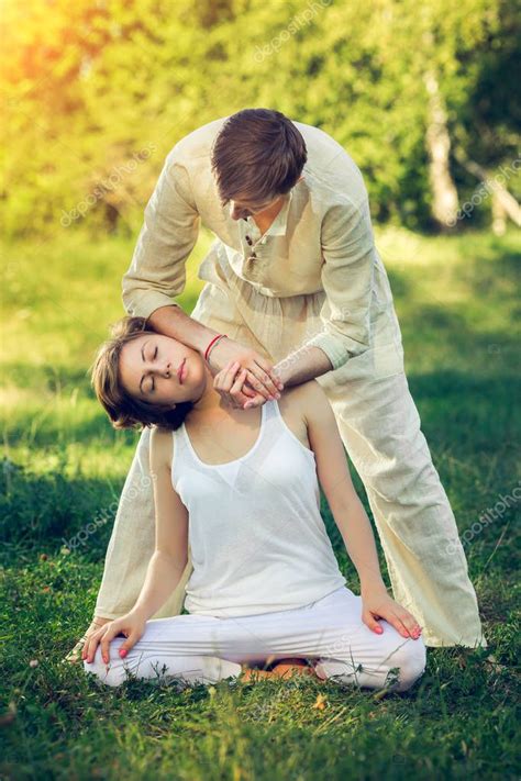 Thai Massage With Yoga Exercises Stock Photo Goinyk