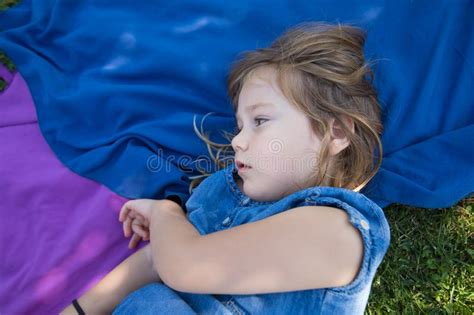 Girl Lying In The Park With Thoughtful Face Stock Image Image Of