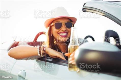 Woman Passenger On Road Trip In Convertible Car Stock Photo Download