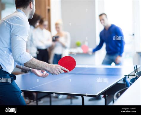 Group Of Young Startup Business People Playing Ping Pong Tennis At