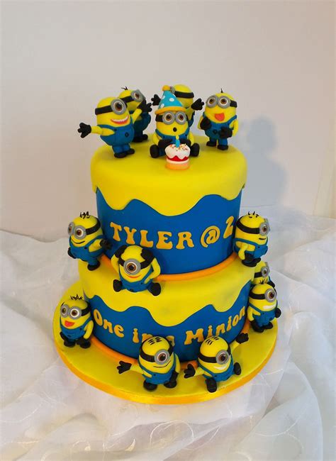 This original design is from pirikos cake design! Two tier Minion themed birthday cake | Minion cake, Cake ...