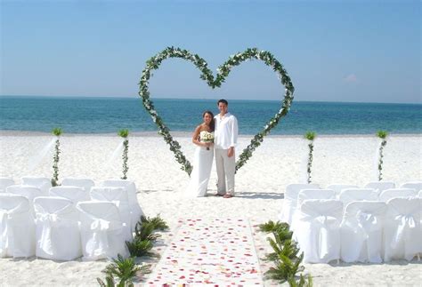 Weddings we planned, ideas to inspire you…….our wedding planners' ultimate goal is to make each wedding as unique as the couple themselves. beach wedding arches | lido beach florida beach wedding arch white sashes Heart shaped | Beach ...
