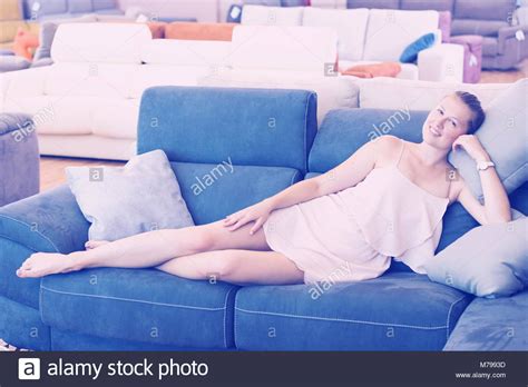 barefoot girl lying on sofa fotos und bildmaterial in hoher auflösung seite 4 alamy