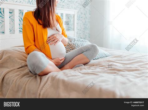 Pregnant Woman Holds Image And Photo Free Trial Bigstock