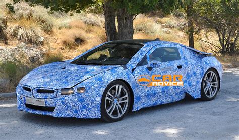 Fuel economy is better than other sports cars, and it can run 18 miles on electricity alone. BMW i8: plug-in hybrid sports car spied hot-weather ...