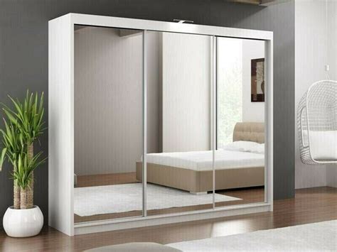 Pro installation and financing available. FURNITURE SALE-FULLY MIRRORED 3 SLIDING DOORS LUX WARDROBE ...