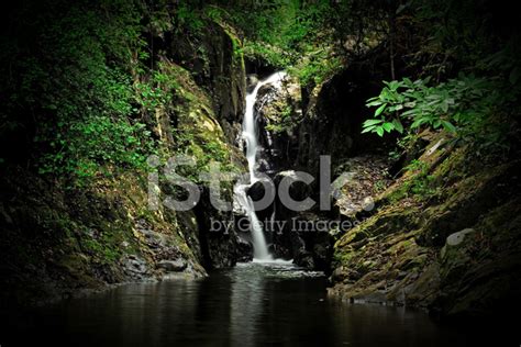 Waterfall With Blue Stream Stock Photo Royalty Free Freeimages