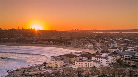 Download Wallpaper 1920x1080 City Aerial View Coast Sunset Sea