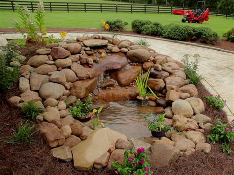 · decide that you want plant fish, and how many other accessories to decorate it. Building a Garden Pond & Waterfall | how-tos | DIY