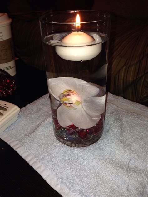 Floating Candle Inside Vase On The Bottom Marbles And A