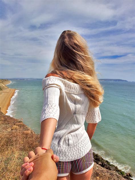 Follow Me Blonde Girl Standing Back On The Edge Cliff Stock Image Image Of People Travel