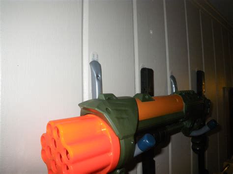 Attach 2 hooks spaced about the same. Nerf Gun Rack Wall Mounted - Top 10 Ways To Make Your Nerf ...