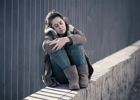 Young Attractive Woman Crying Suffering From Depression Sitting Stock