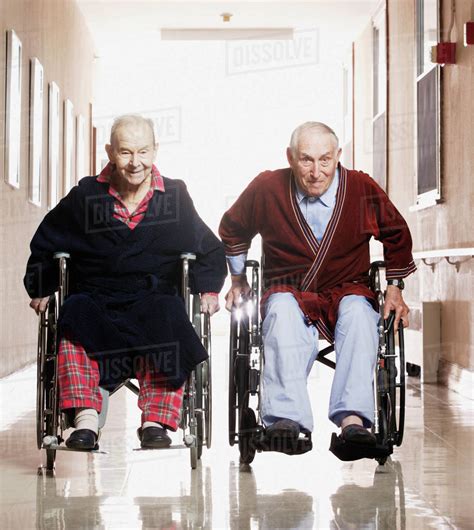 Elderly Men Racing In Wheelchairs Stock Photo Dissolve