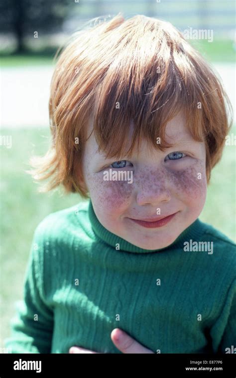 A Four Year Old American Boy With Red Hair Blue Eyes And A Freckled