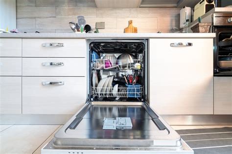 Why is the clean light blinking on my kitchenaid dishwasher. My KitchenAid Dishwasher's "Heavy Duty" and "Normal ...