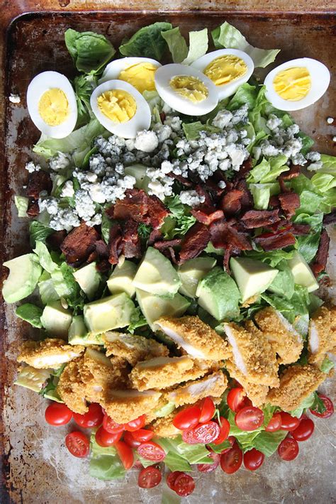 On a plate, arrange your greens, salad ingredients and top with fried chicken strips and salad dressing. Gluten Free Fried Chicken Cobb Salad - Heather Christo