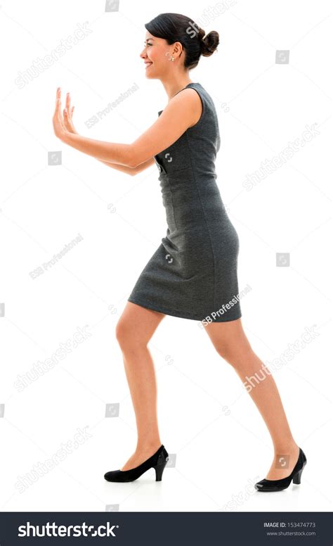 Business Woman Pushing Imaginary Object Isolated Stock Photo