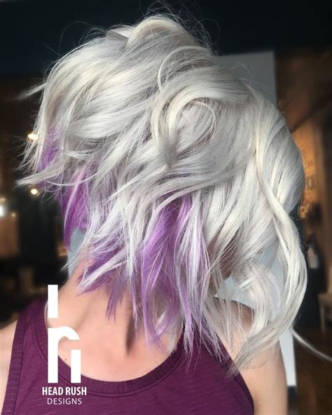 It involves having a dark root, a blonde base, and a gradual fade to a soft lilac hue. Platinum blonde bob with pops of purple | Hair styles ...