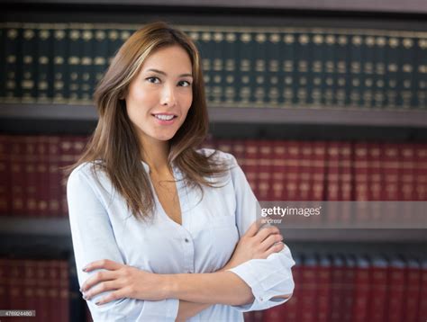 Successful Asian Lawyer Or Business Woman At The Office With Book At
