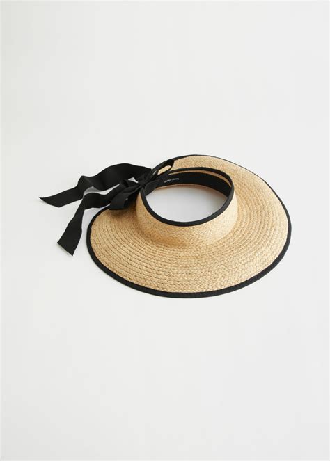 7 Chic Straw Sun Visors Thatll Keep The Sun Off Your Face Wellgood