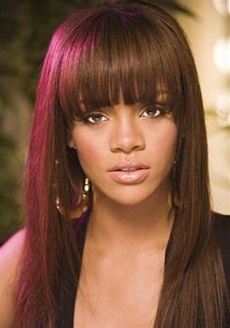The crimson highlights are woven into the black hair with fiery orange undertones, making this the style for lovers of bold. Weave Hairstyles - Hairstyles