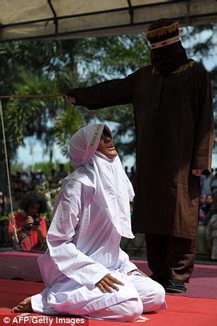 Man And Woman Are Caned Times Each In Brutal Punishment For