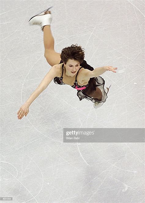 Irina Slutskaya Of Russia Jumps During The Qualifying Free Skate