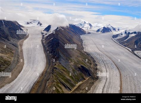 Kaskawulsh Glacier Split By Mountains In Kluane National Park Yukon