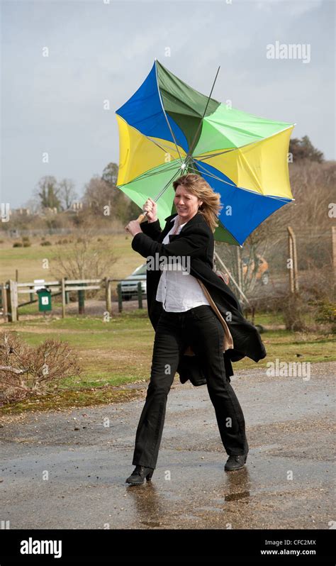 Umbrella Blowing Wind Hi Res Stock Photography And Images Alamy