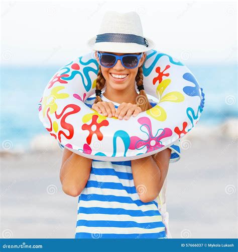 Beach Woman Happy And Colorful Wearing Sunglasses And Beach Hat Having