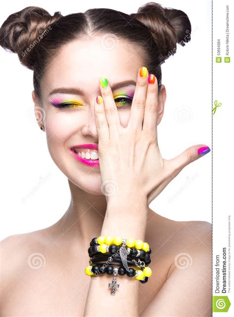 Beautiful Model Girl With Bright Colored Makeup And Nail