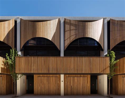 The Skin Of Timber Fringing On These Townhomes Is Meant To Be A Modern