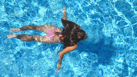 Unrecognizable Beautiful Girl Floating Across The Pool Of Hotel Young Woman Nature Stock