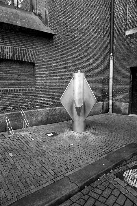 Public Urinal In A City By Stocksy Contributor Marcel Stocksy