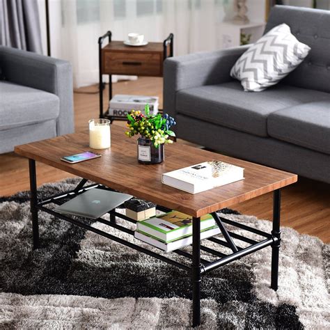 Here, a table and chairs gather on one side of the room, providing a spot for informal meals or games. Giantex 2Tier Rustic Coffee Table Metal Frame Modern ...