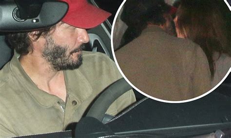 Keanu Reeves Spotted Canoodling With Mystery Brunette As The Pair Share