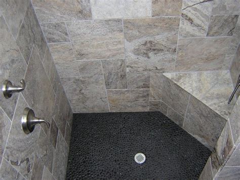 Steam cleaners are a great tool for cleaning stone and grout in your shower. Image result for black river stone shower floor | Pebble ...