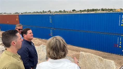 Arizona Gov Doug Ducey Agrees To Take Down Shipping Containers Along
