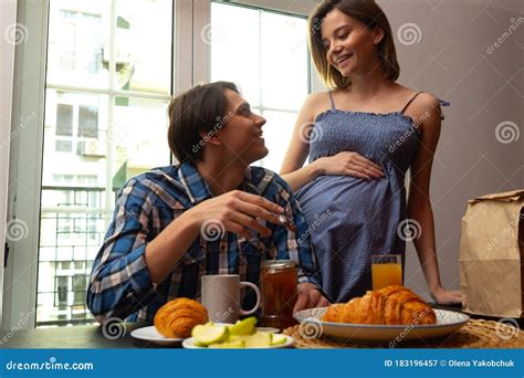 Happy Pregnant Woman Preparing Meals For Husband Stock Image Image Of Father Help 183196457