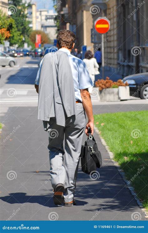 Businessman Walking Down The Street Stock Image Image Of Person