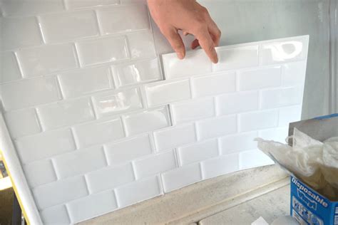 Take a look at some of these. Paint by the light: Installing peel and stick tile